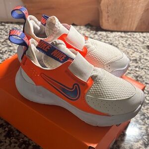Nike Kids Cream and Orange Slip-On Sneakers with Blue Swoosh